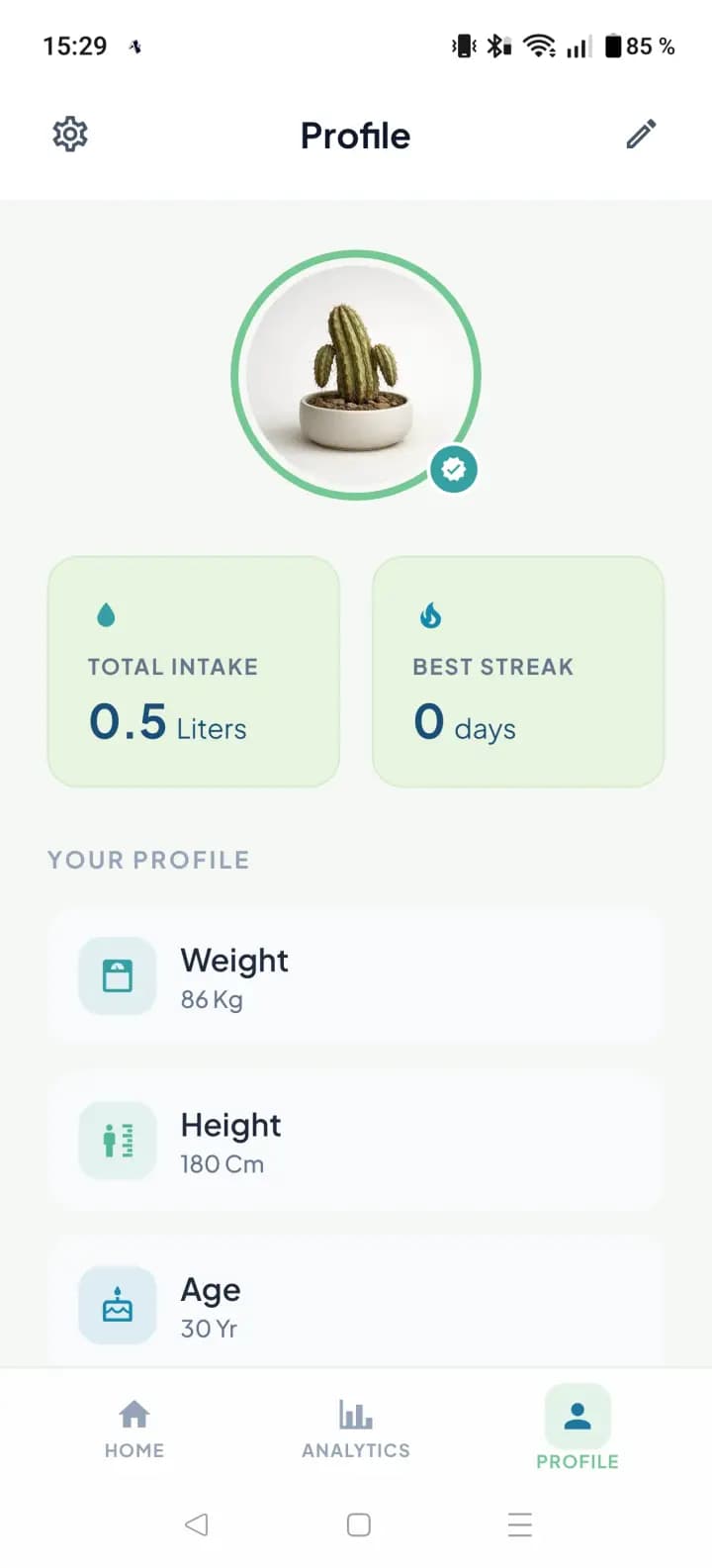 Cactus water reminder app — profile screen with personal hydration target, reminders, and routine setup